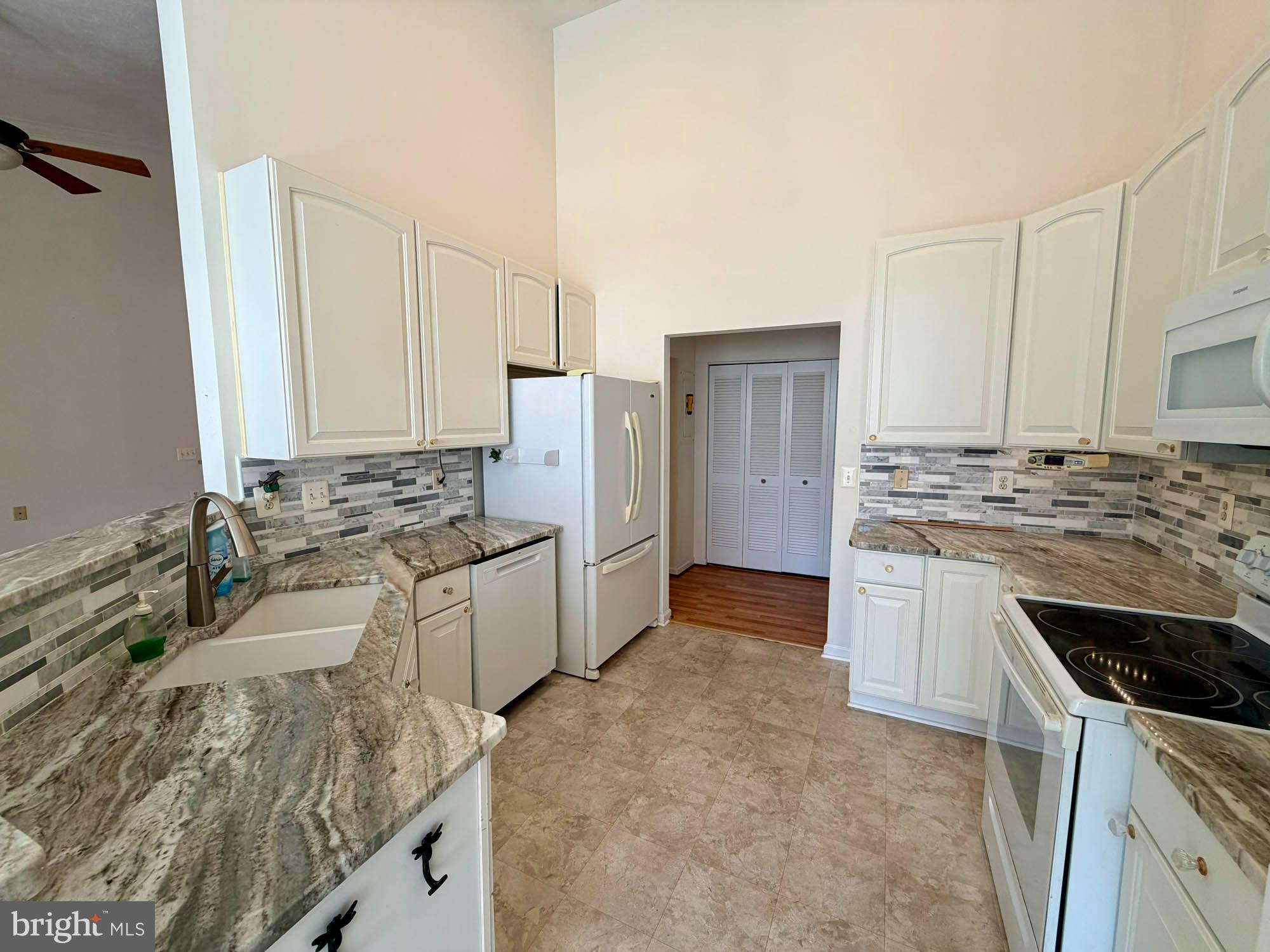 4501 Talcott Terrace, Unit 4501P Perry Hall, MD 21128 - Photo 10 of 21 a kitchen with a sink stove and refrigerator