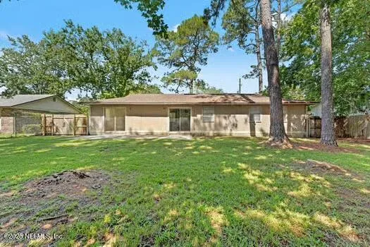 a front view of a house with a garden and porch