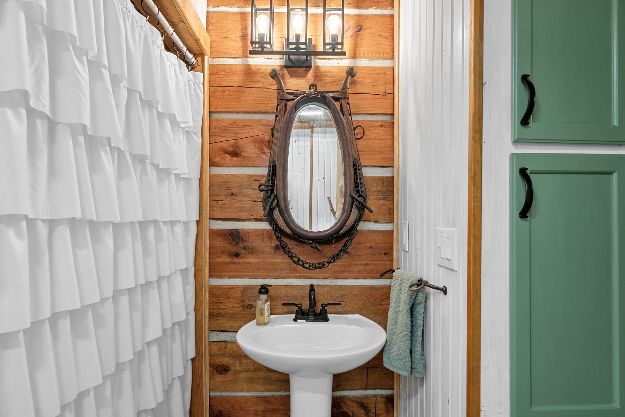 1205 Shakerag Road Hanson, KY 42413 - Photo 23 of 50 a bathroom with a sink and a mirror