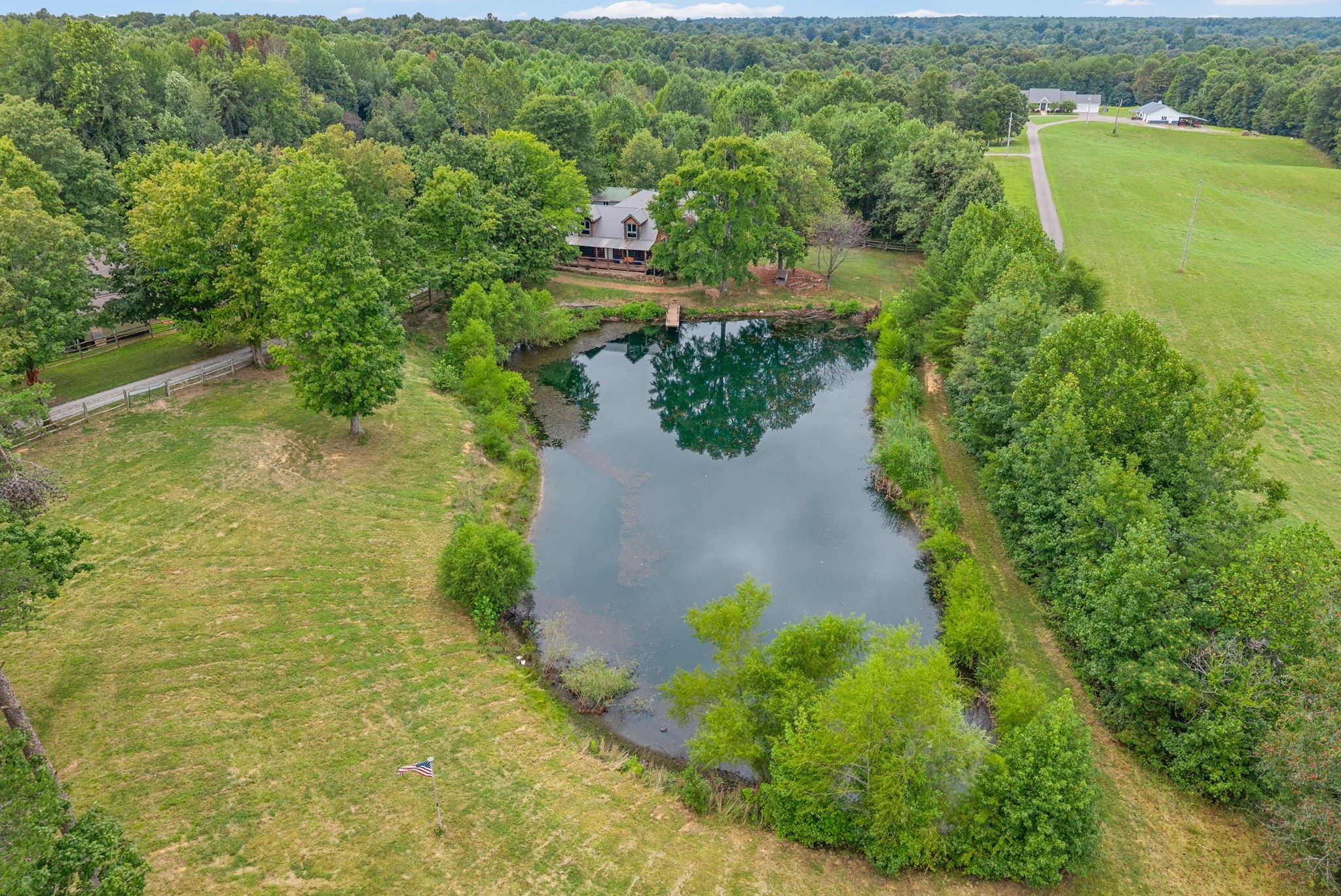 1205 Shakerag Road Hanson, KY 42413 - Photo 39 of 50 a view of a lake with a yard