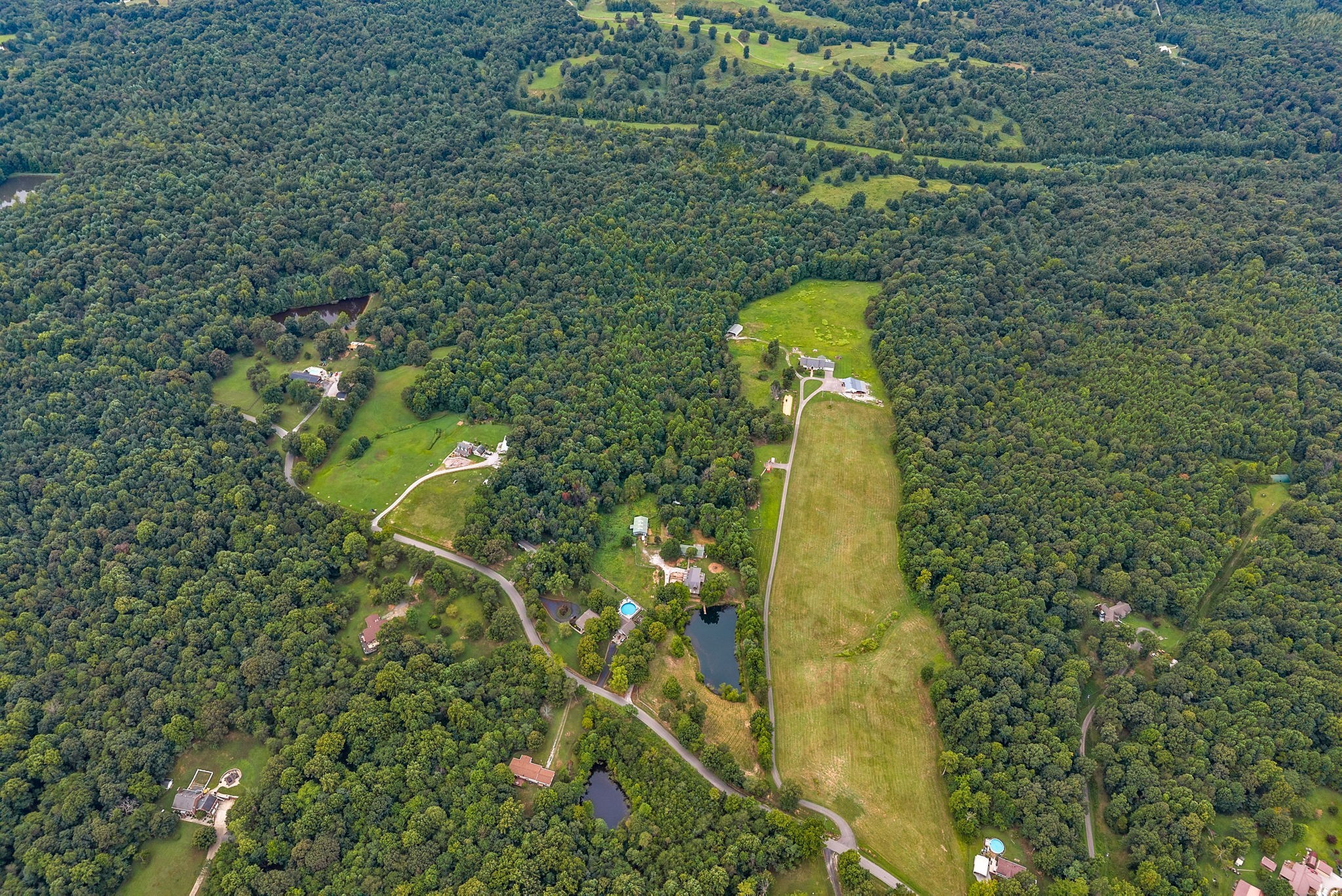 1205 Shakerag Road Hanson, KY 42413 - Photo 45 of 50 a aerial view of a residential houses with yard