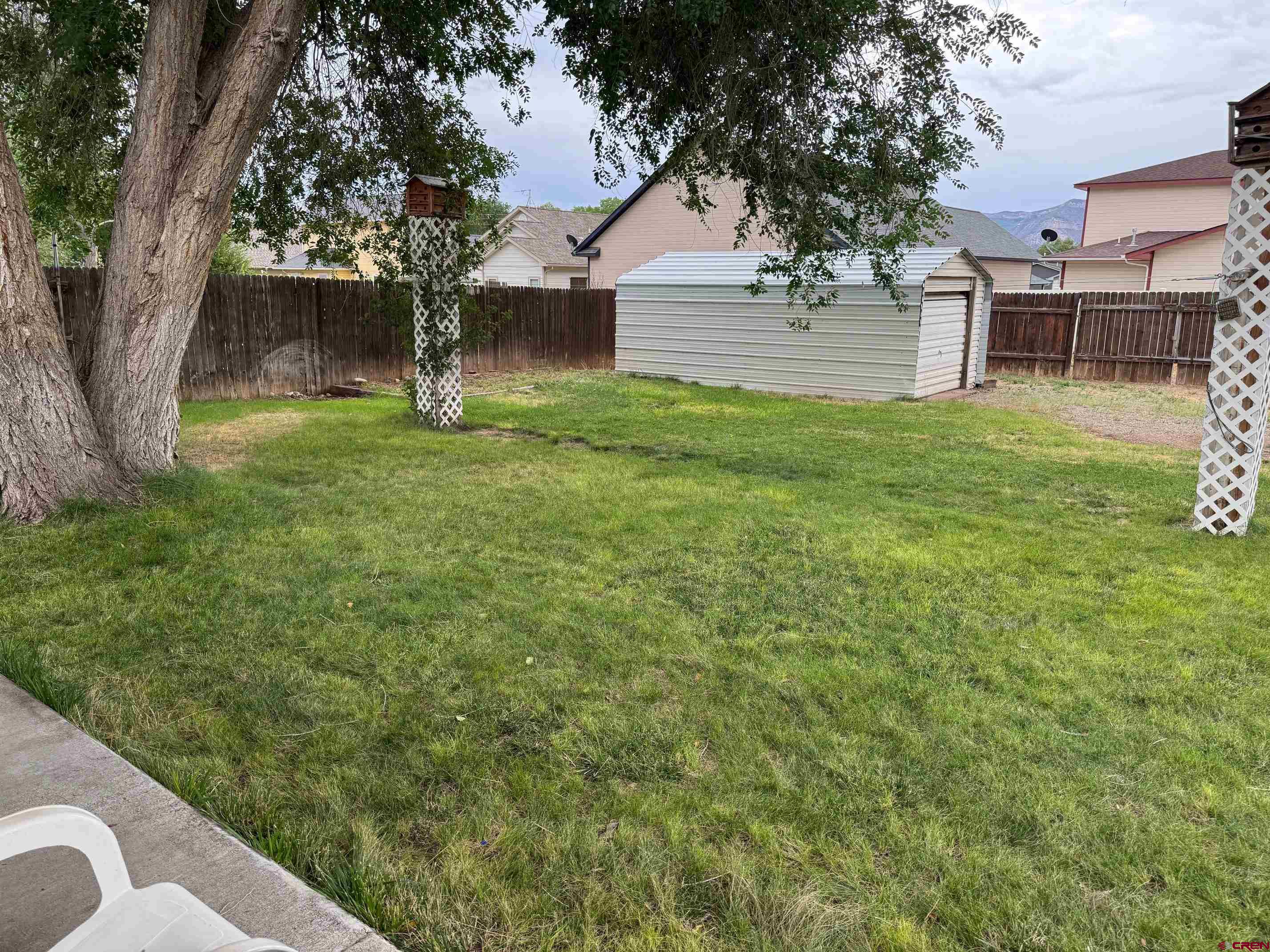 425 West 7th Street Cortez, CO 81321 - Photo 22 of 22 a view of a tree in front of a house