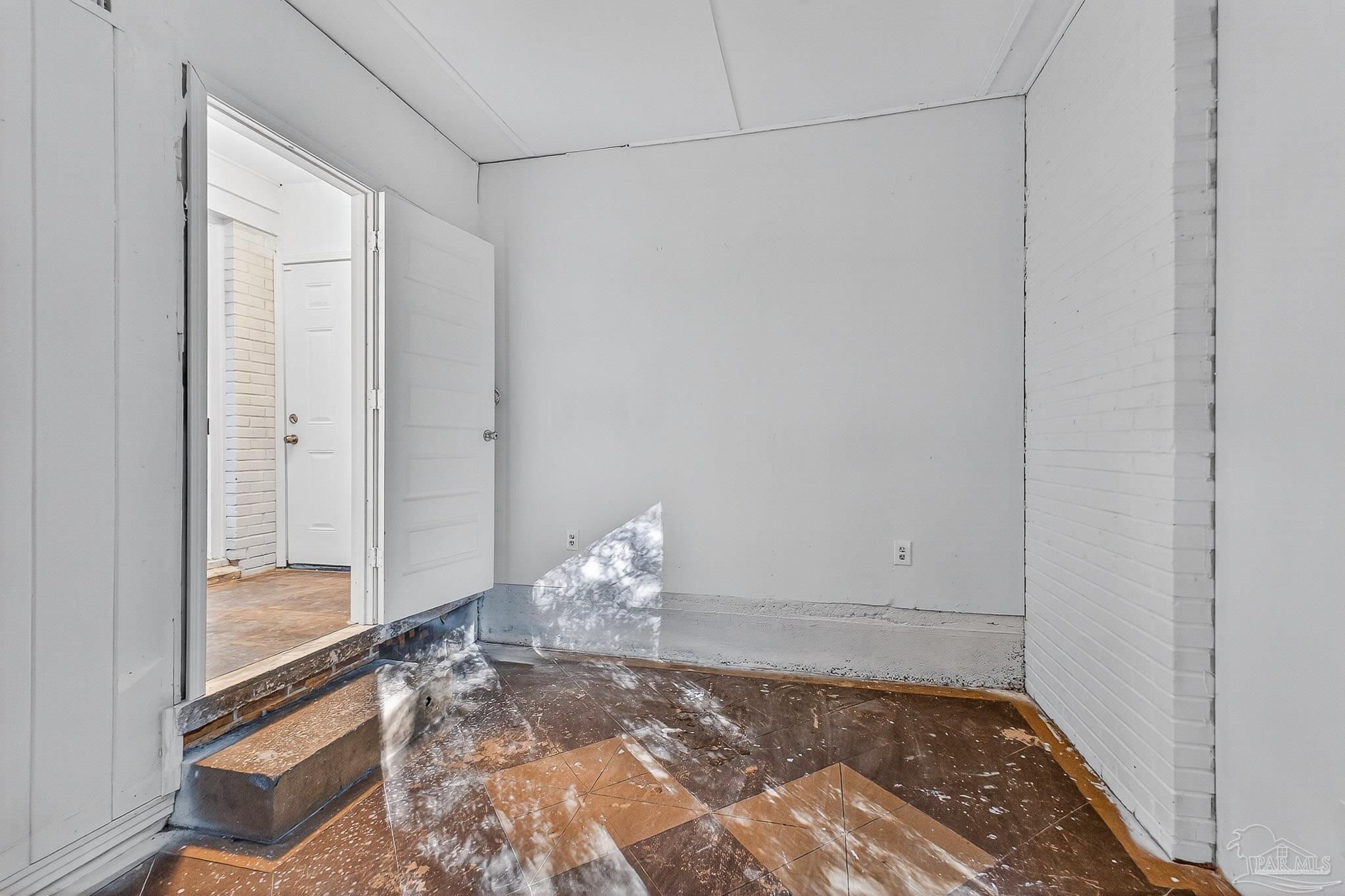 6571 Cedar Street Milton, FL 32570 - Photo 38 of 47 a view of wooden door