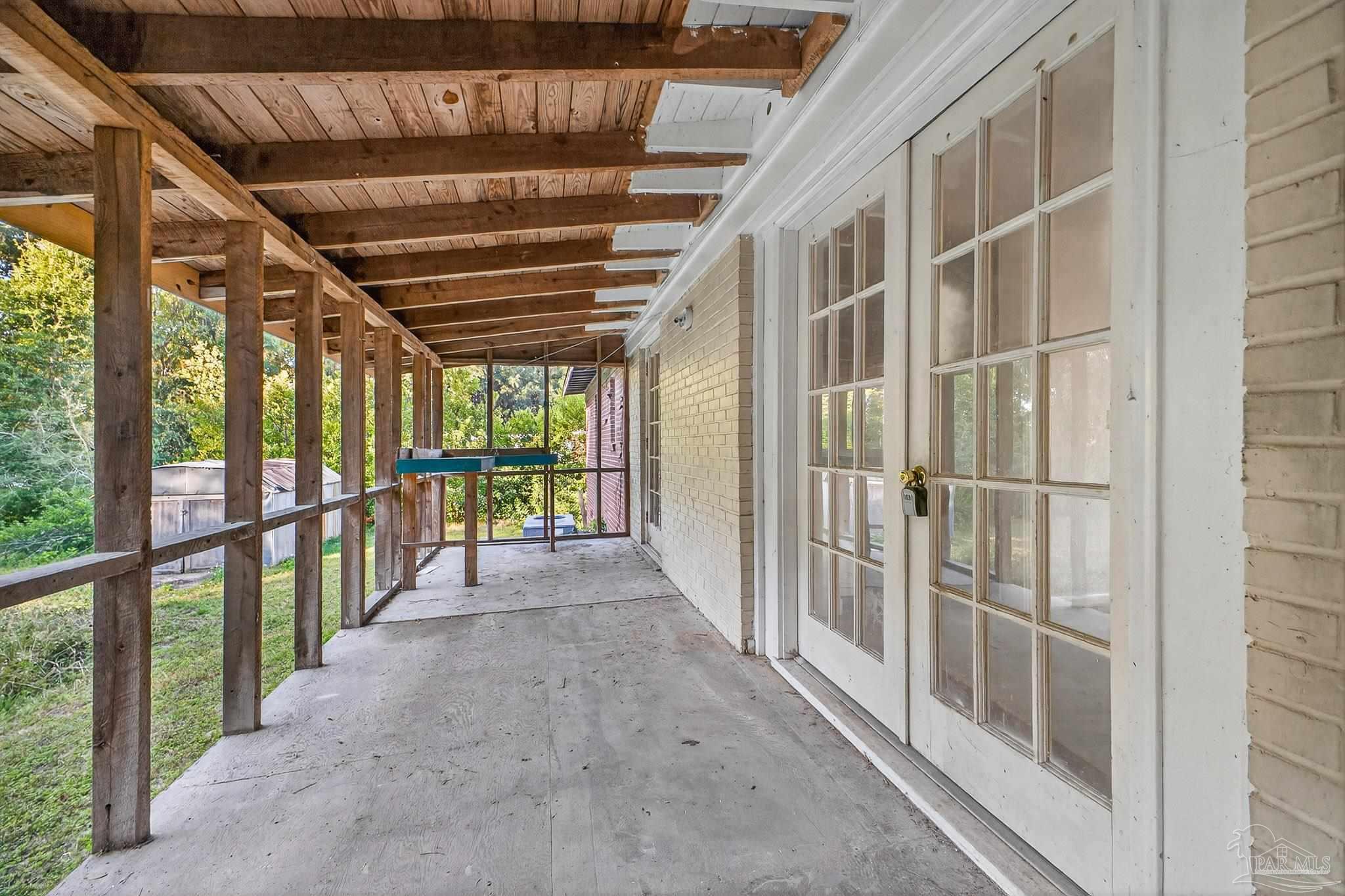 6571 Cedar Street Milton, FL 32570 - Photo 42 of 47 a view of a porch