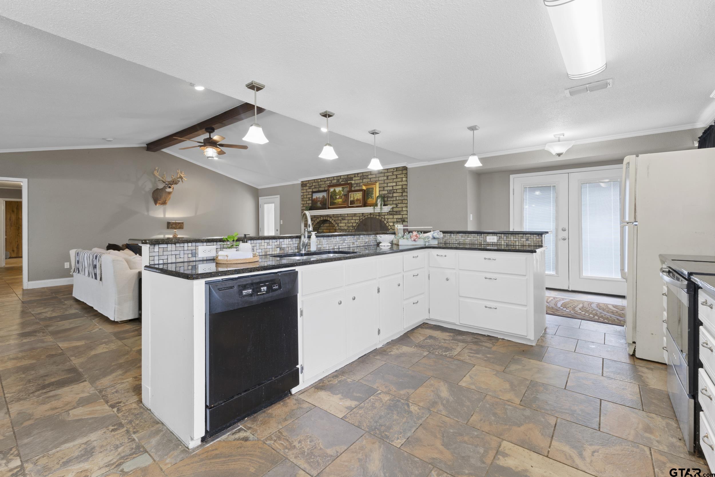 38 Quail Valley Road Mount Vernon, TX 75457 - Photo 19 of 46 a kitchen with a stove cabinets and counter space