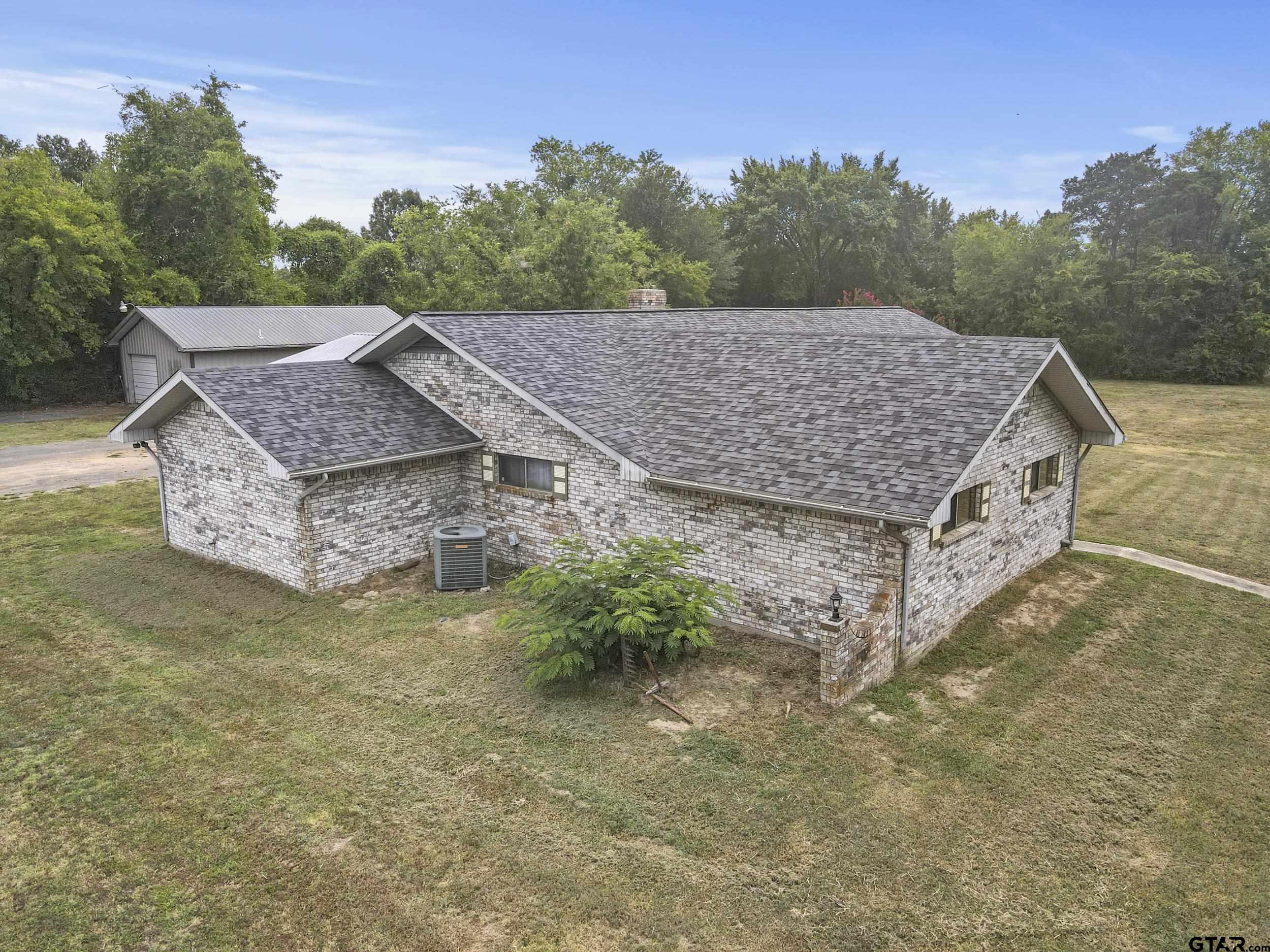38 Quail Valley Road Mount Vernon, TX 75457 - Photo 2 of 46 an aerial view of a house with a yard