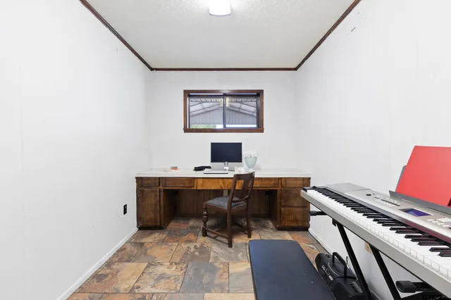 a workspace with furniture and rug