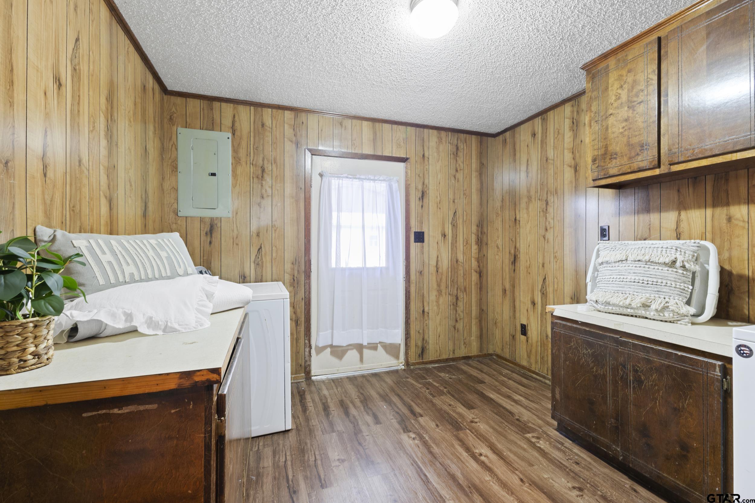 38 Quail Valley Road Mount Vernon, TX 75457 - Photo 28 of 46 a kitchen with stainless steel appliances a stove a sink a refrigerator and wooden floor