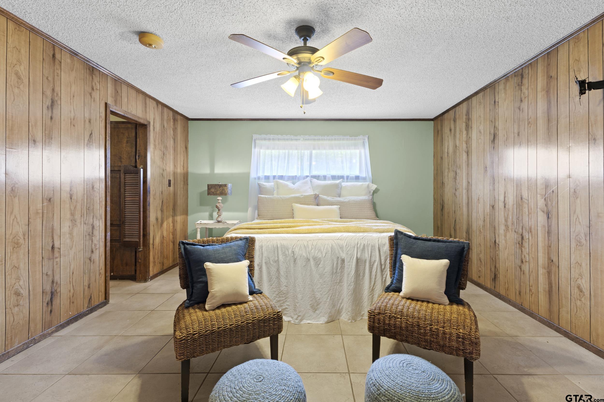38 Quail Valley Road Mount Vernon, TX 75457 - Photo 31 of 46 a living room with furniture and chandelier