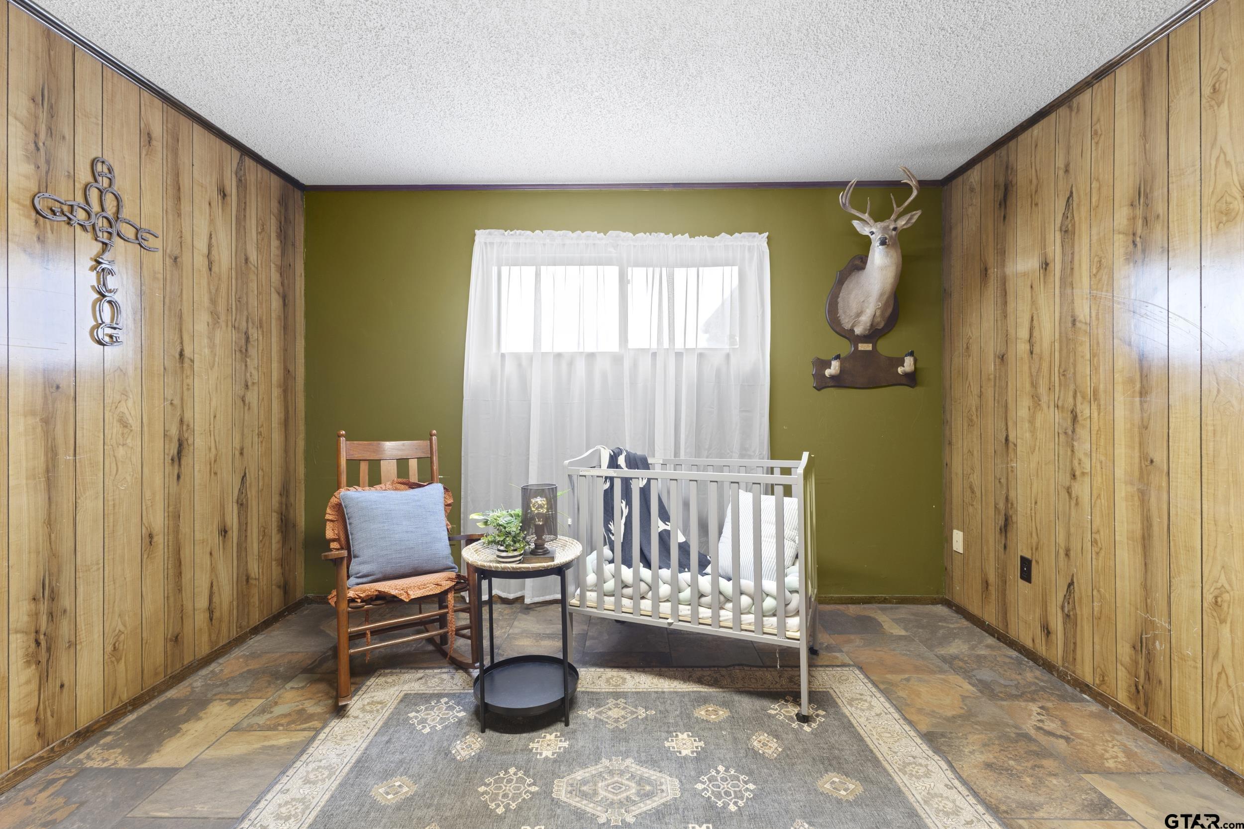 38 Quail Valley Road Mount Vernon, TX 75457 - Photo 33 of 46 a living room with furniture and a window