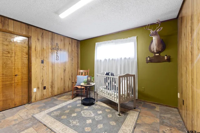 a view of a room with a window and balcony