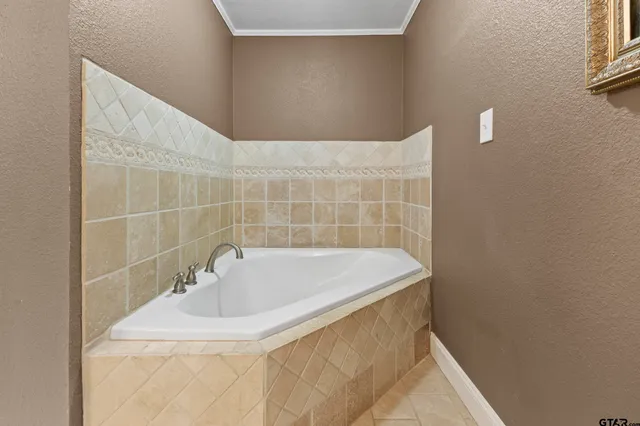 a bathroom with a sink and a bathtub