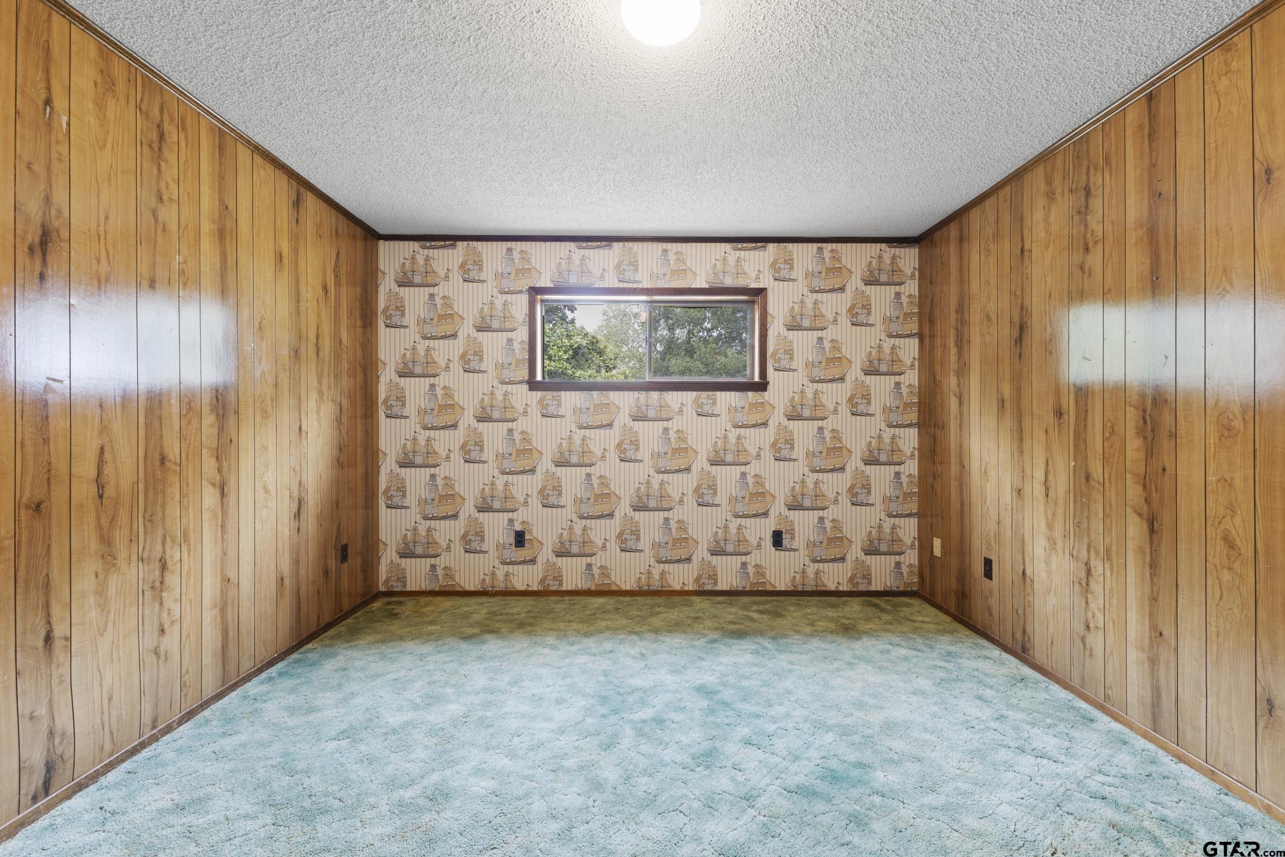 38 Quail Valley Road Mount Vernon, TX 75457 - Photo 39 of 46 a view of an empty room with a window