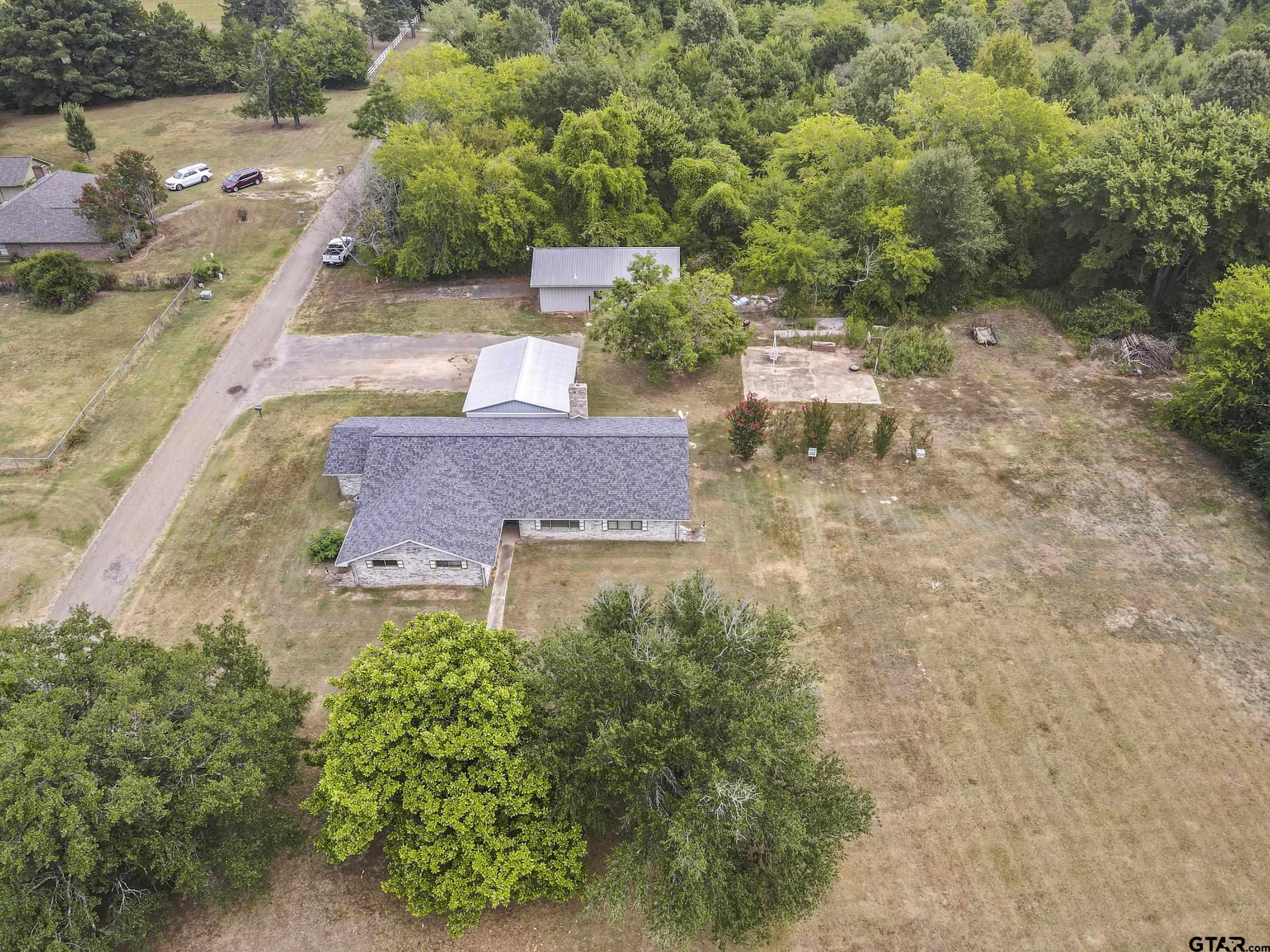 38 Quail Valley Road Mount Vernon, TX 75457 - Photo 4 of 46 an aerial view of house with yard