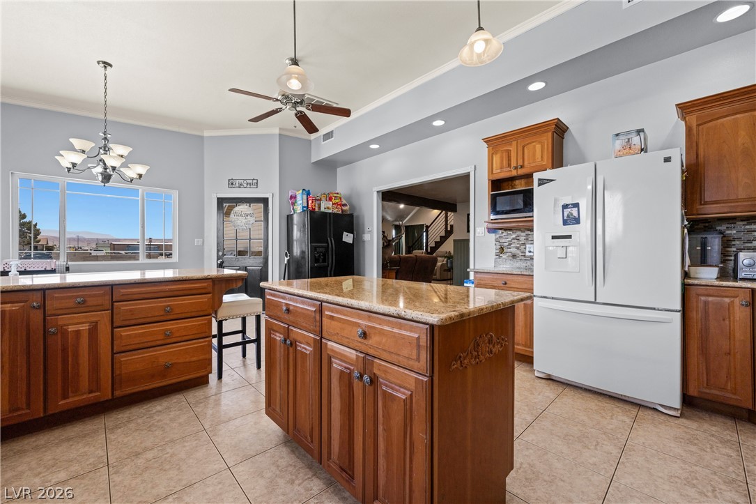 750 Leming Avenue Overton, NV 89040 - Photo 22 of 82 This spacious kitchen offers ample counter space and a convenient island, perfect for culinary endeavors.