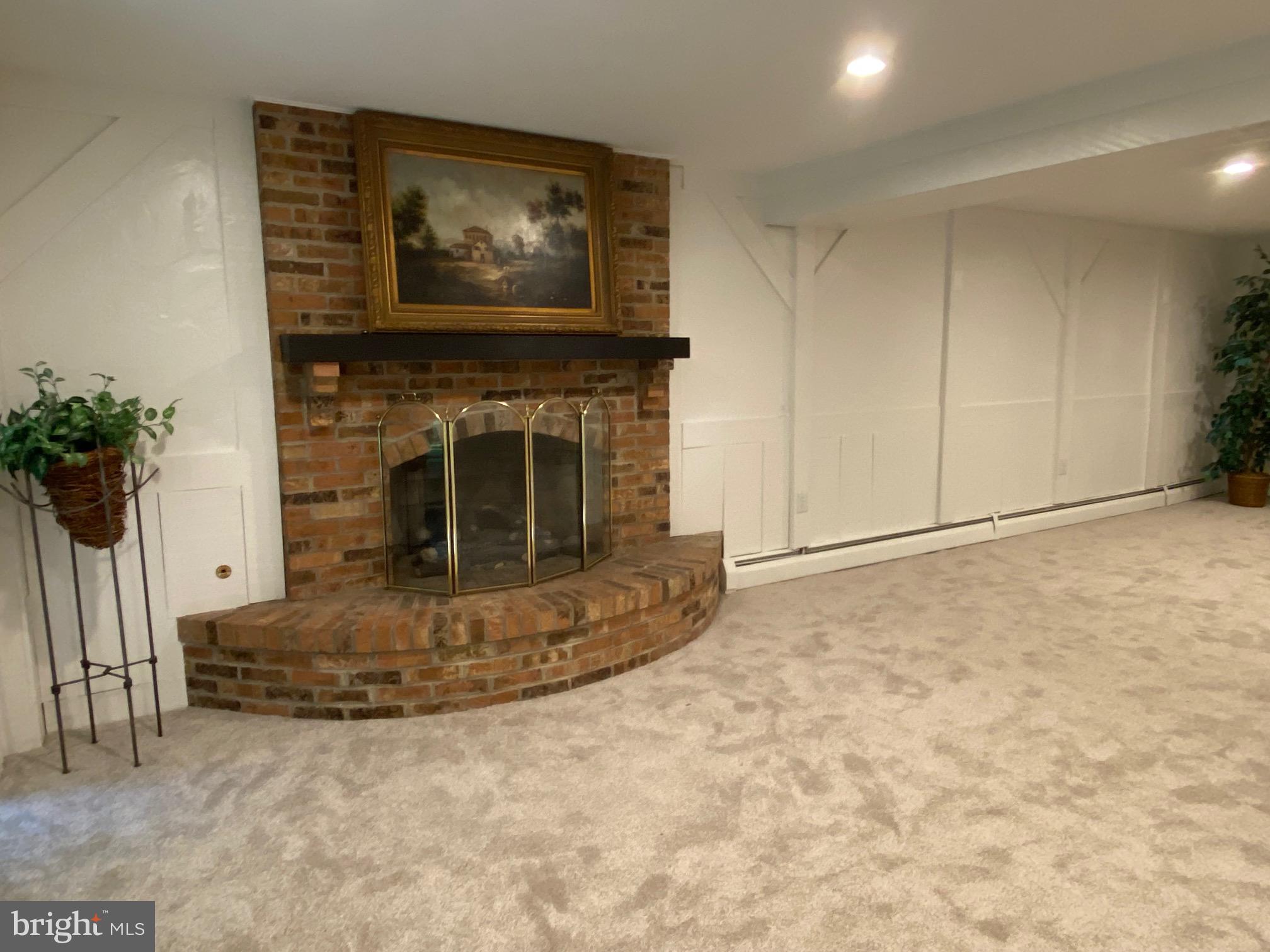 2741 Hill Road Vienna, VA 22181 - Photo 51 of 63 Lower level fireplace