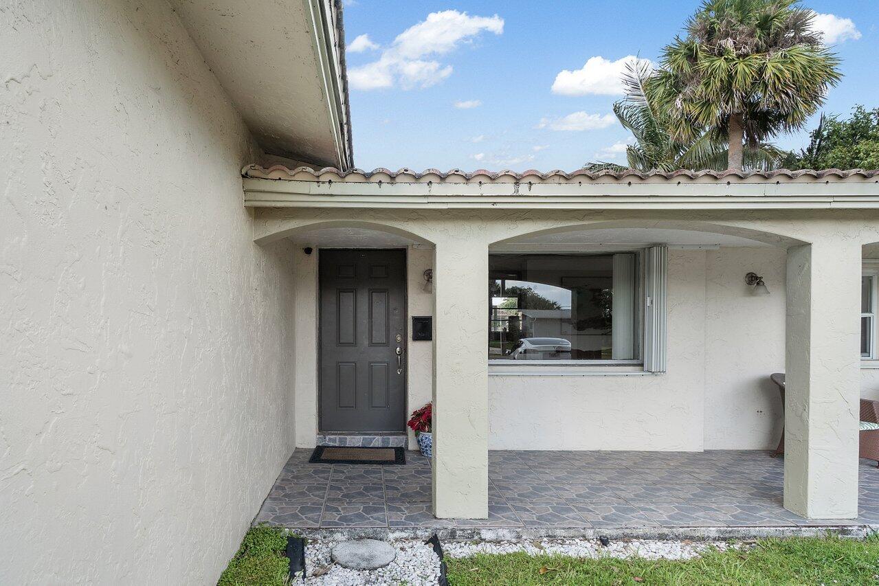1069 West Camino Real Boca Raton, FL 33486 - Photo 3 of 21 Front porch