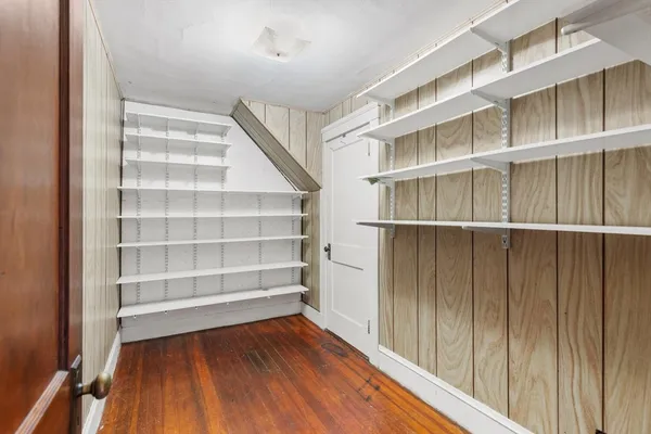 a bathroom with a tub shower and sink