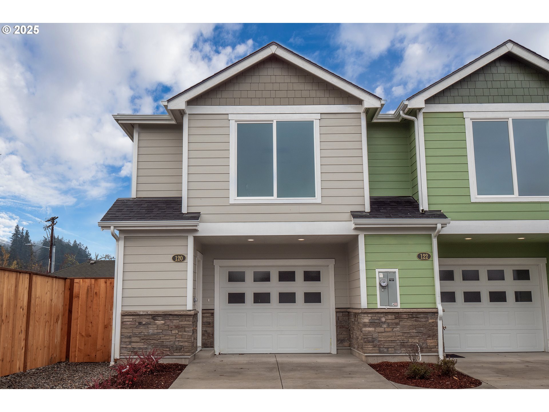 120 65th Place Springfield, OR 97478 - Photo 1 of 45 a front view of a house with a yard and garage