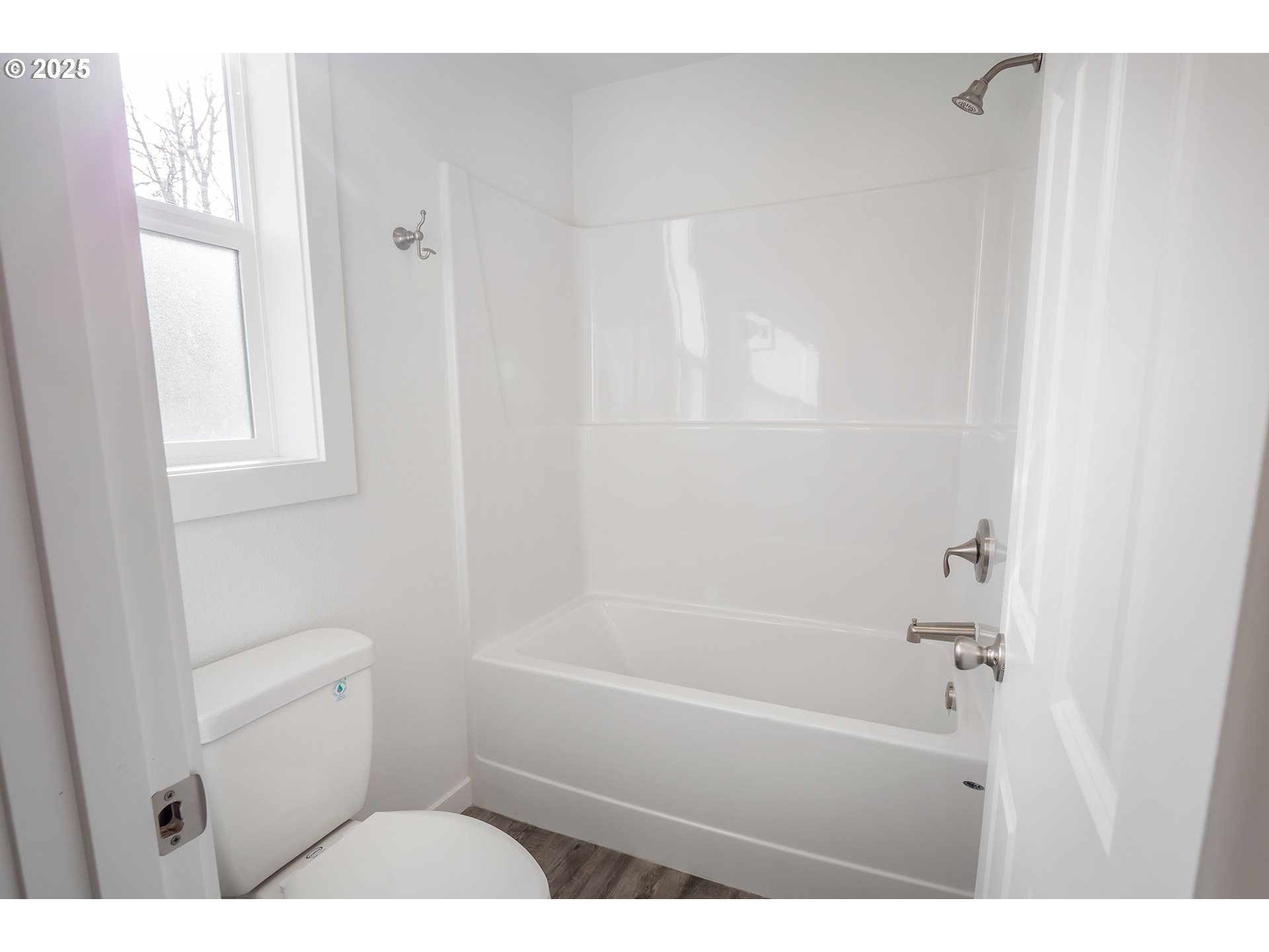 120 65th Place Springfield, OR 97478 - Photo 22 of 45 a bathroom with a toilet and a bathtub