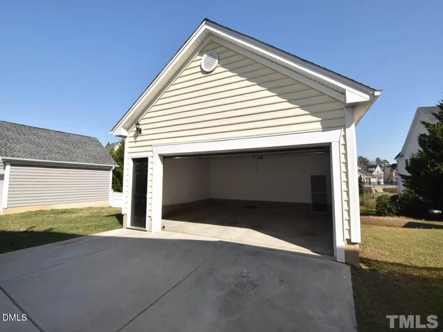 a view of a house with a garage