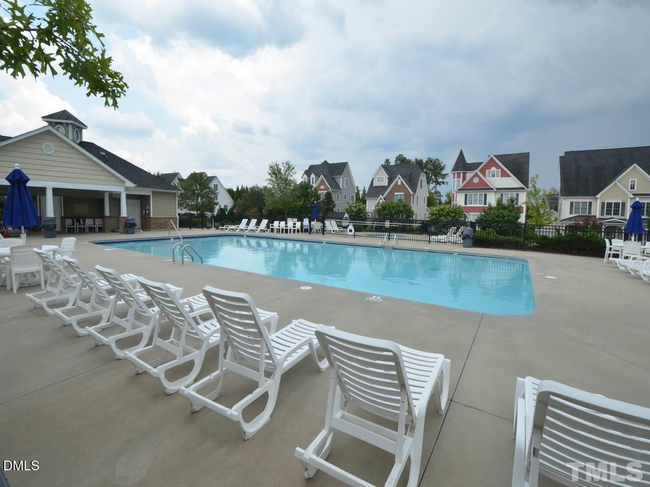 118 Fort Jackson Road Morrisville, NC 27560 - Photo 19 of 21 a view of a lake with a house in the background