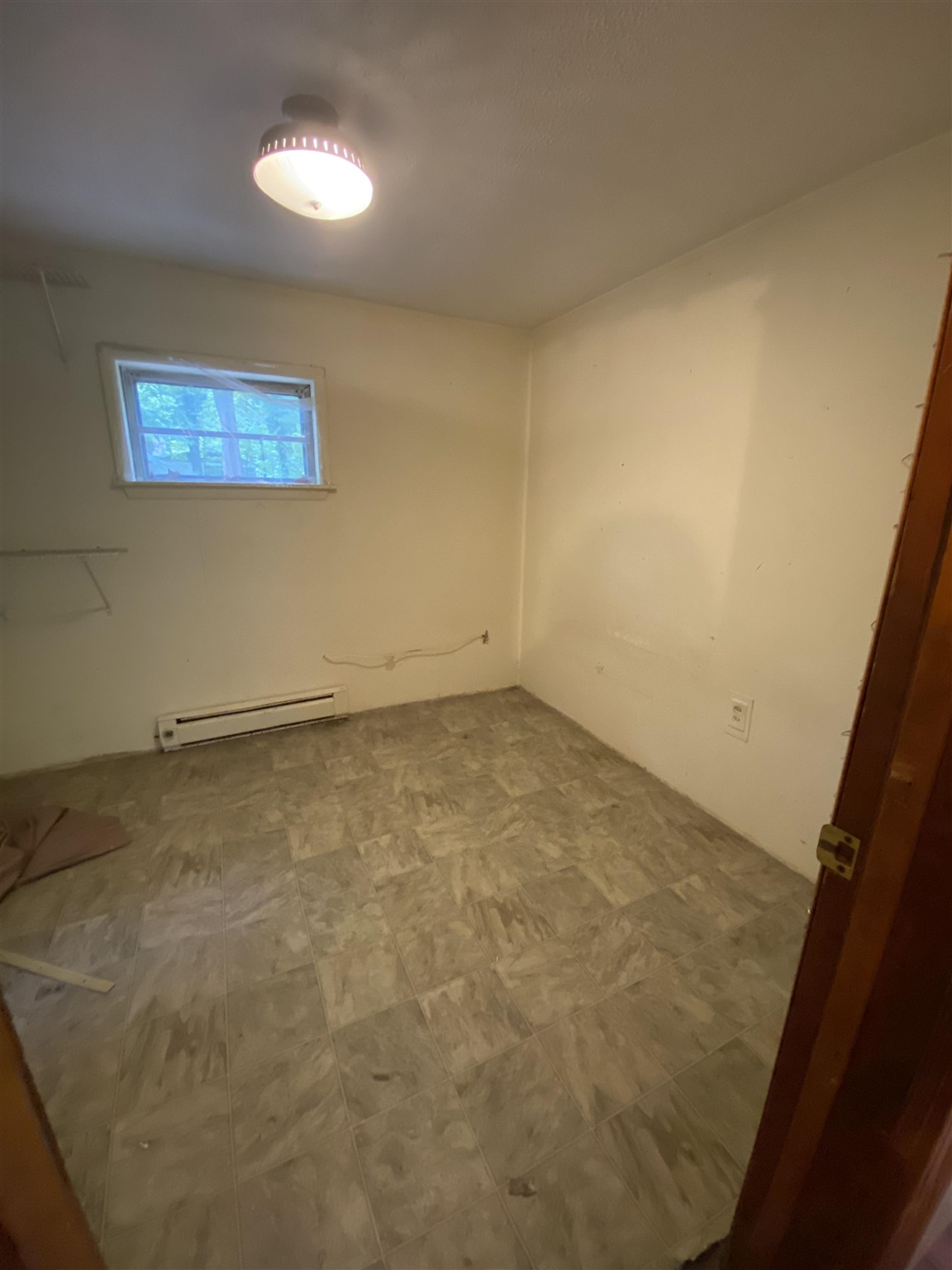 8600 Briery Branch Road Dayton, VA 22821 - Photo 9 of 13 an empty room with a natural light