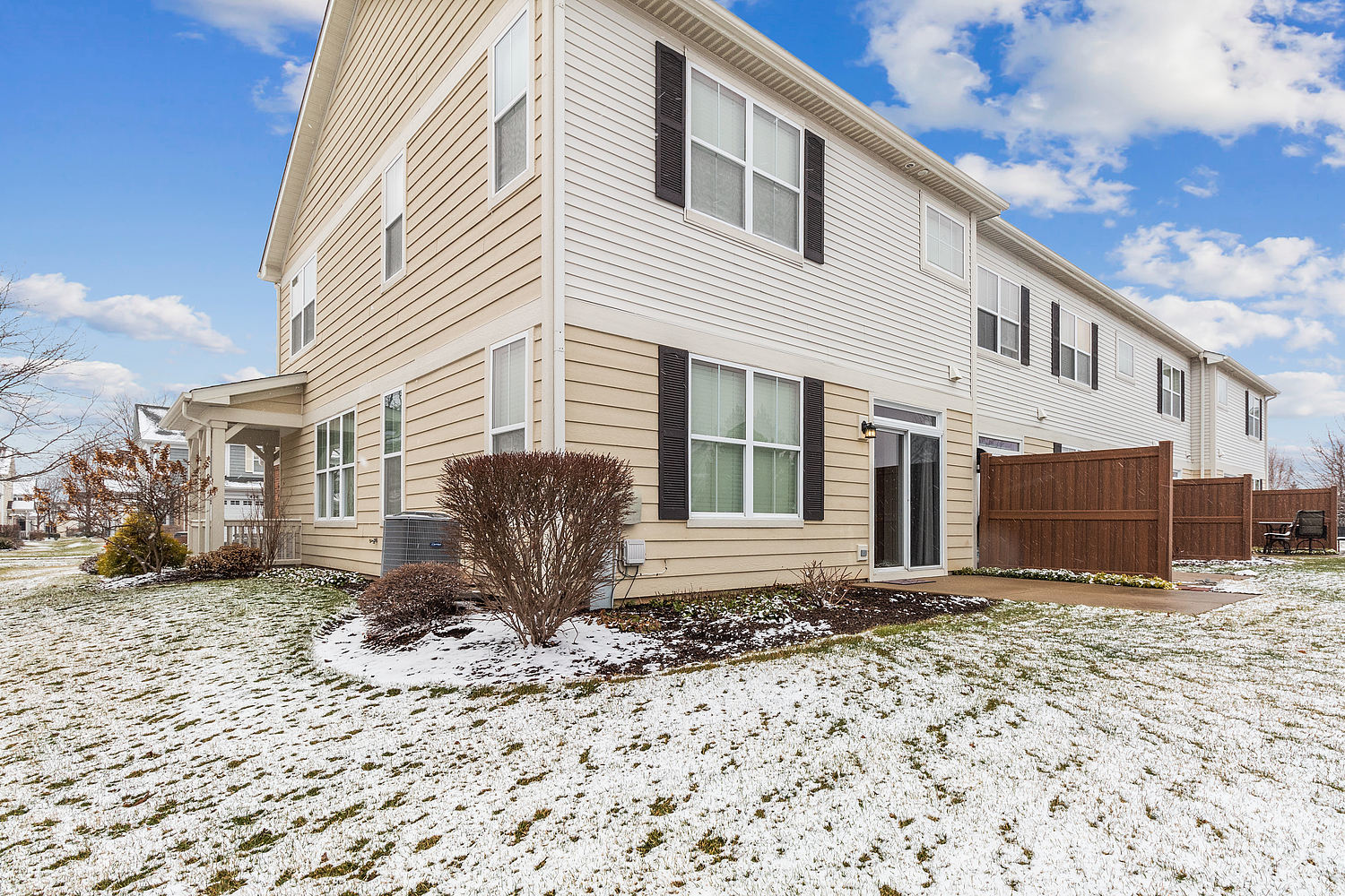 427 Azalea Street Elgin, IL 60124 - Photo 4 of 28 a front view of a house with a yard