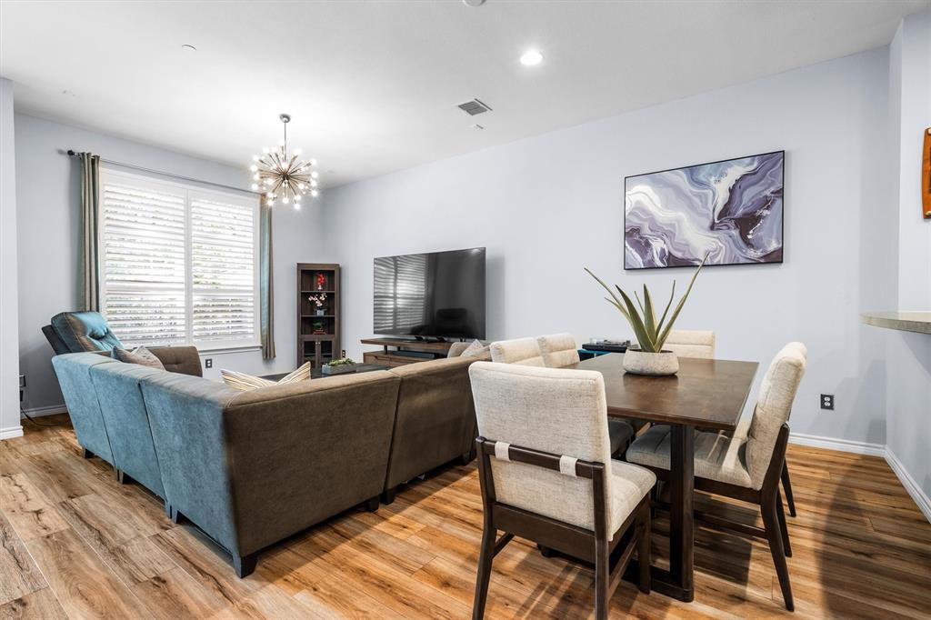 5019 Morris Avenue, Unit 22 Addison, TX 75001 - Photo 11 of 31 a living room with furniture and a flat screen tv
