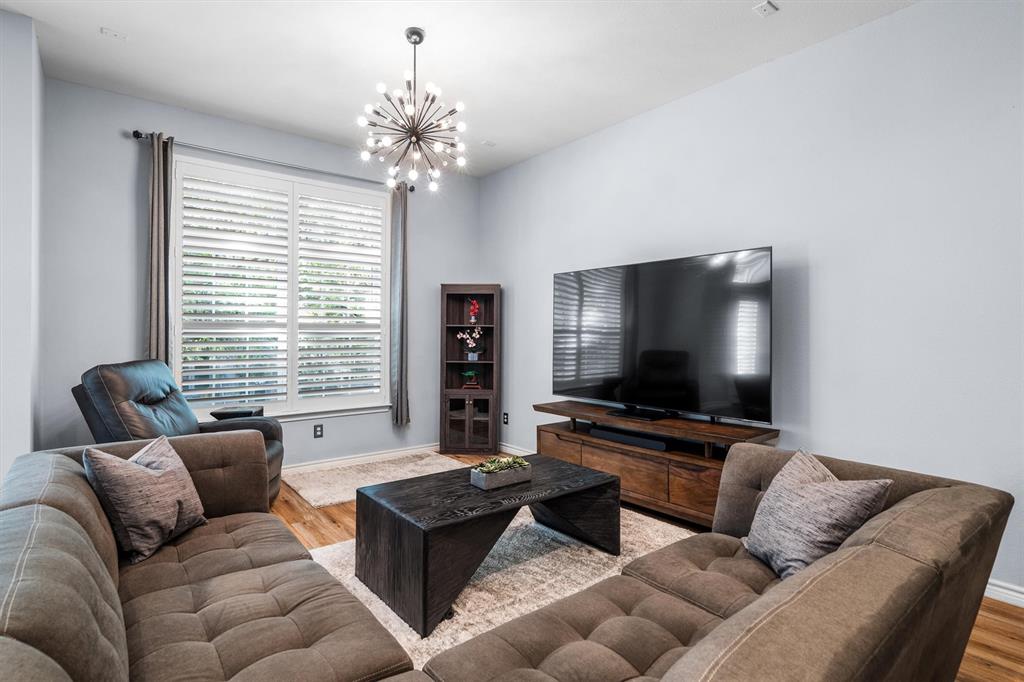 5019 Morris Avenue, Unit 22 Addison, TX 75001 - Photo 12 of 31 a living room with furniture and a flat screen tv