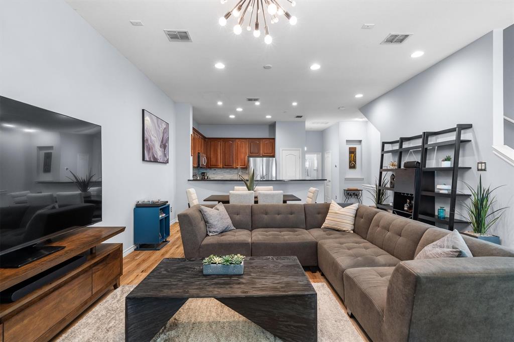 5019 Morris Avenue, Unit 22 Addison, TX 75001 - Photo 14 of 31 a living room with furniture and a flat screen tv