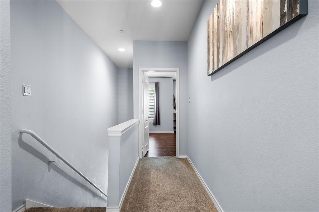 5019 Morris Avenue, Unit 22 Addison, TX 75001 - Photo 19 of 31 a view of a hallway with toilet