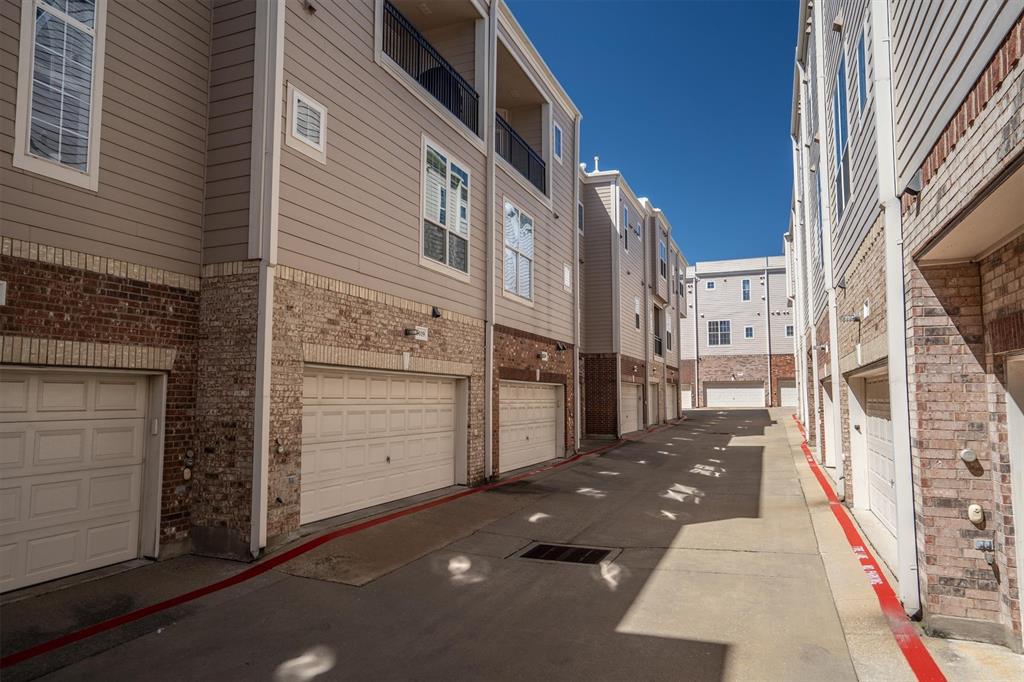 5019 Morris Avenue, Unit 22 Addison, TX 75001 - Photo 29 of 31 an outdoor view of a building with many windows