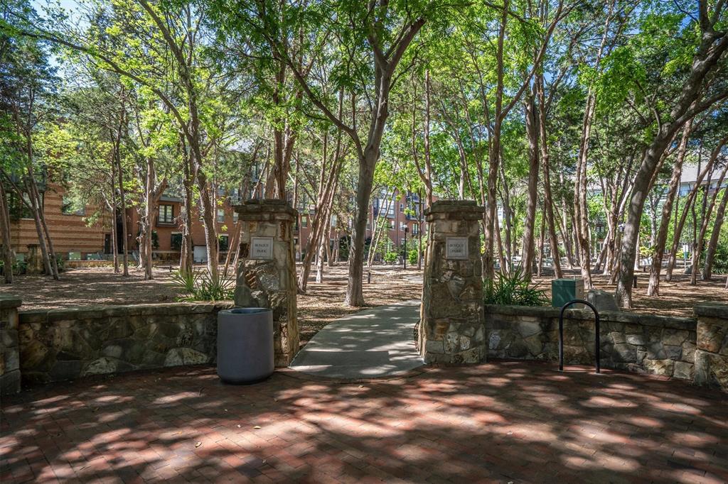 5019 Morris Avenue, Unit 22 Addison, TX 75001 - Photo 30 of 31 a view of a patio with table and chairs and potted plants