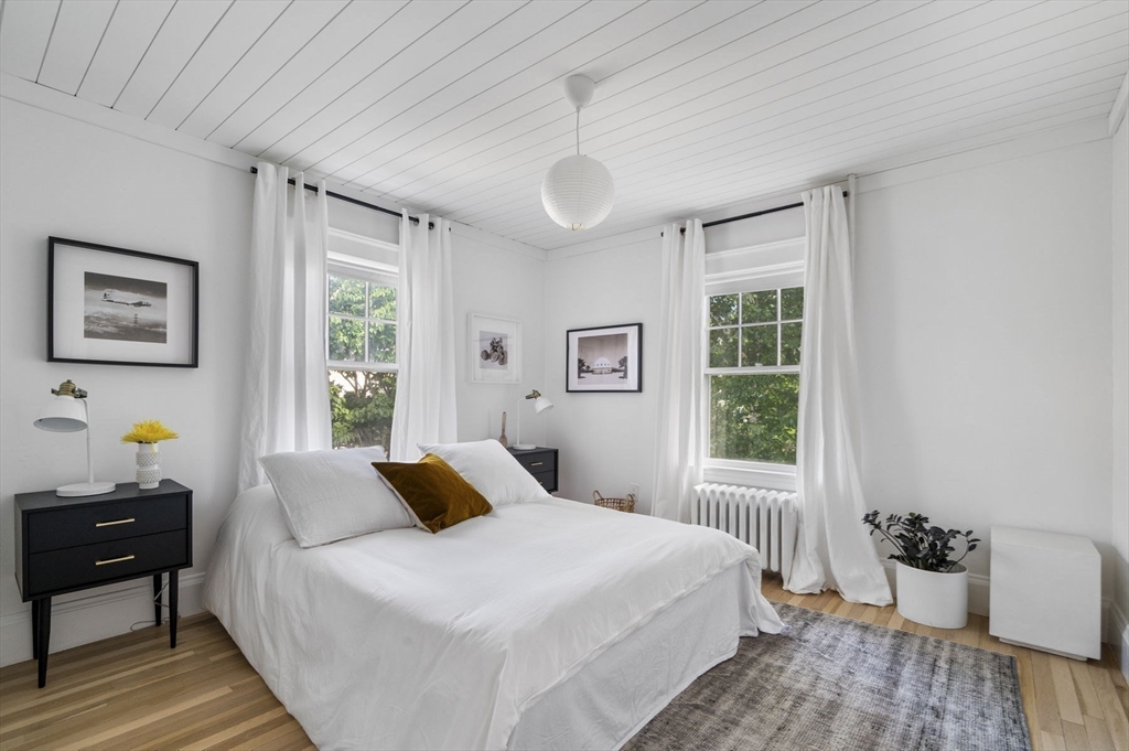 5 Chesterlee Lane Swampscott, MA 01907 - Photo 29 of 42 a bedroom with bed and wooden floor