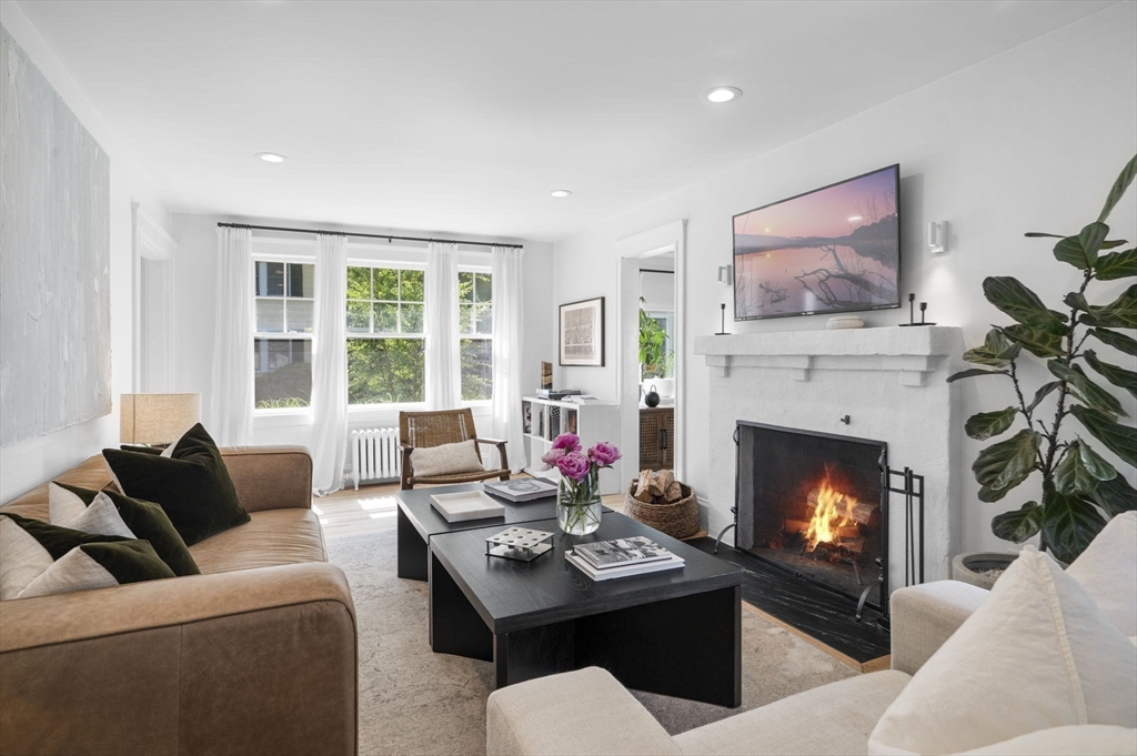 5 Chesterlee Lane Swampscott, MA 01907 - Photo 4 of 42 a living room with furniture a fireplace and a large window