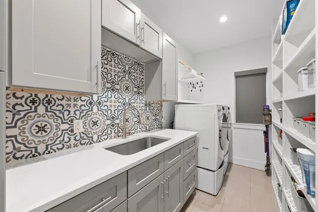 a utility room with dryer and washer