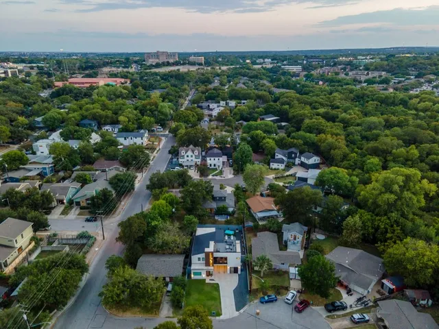 an aerial view of a city with lots of residential buildings