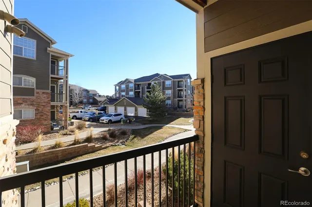 a view of city from a balcony