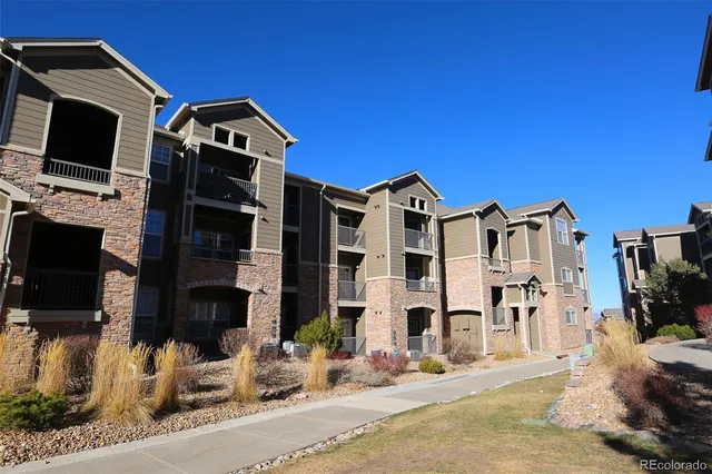 a front view of a building with multiple windows