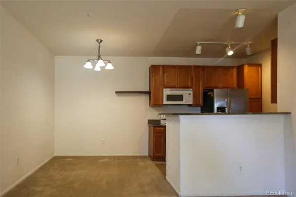 wooden floor in an empty room with a fireplace