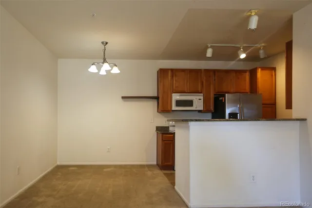 wooden floor in an empty room with a fireplace