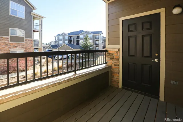a view of balcony with a potted plant