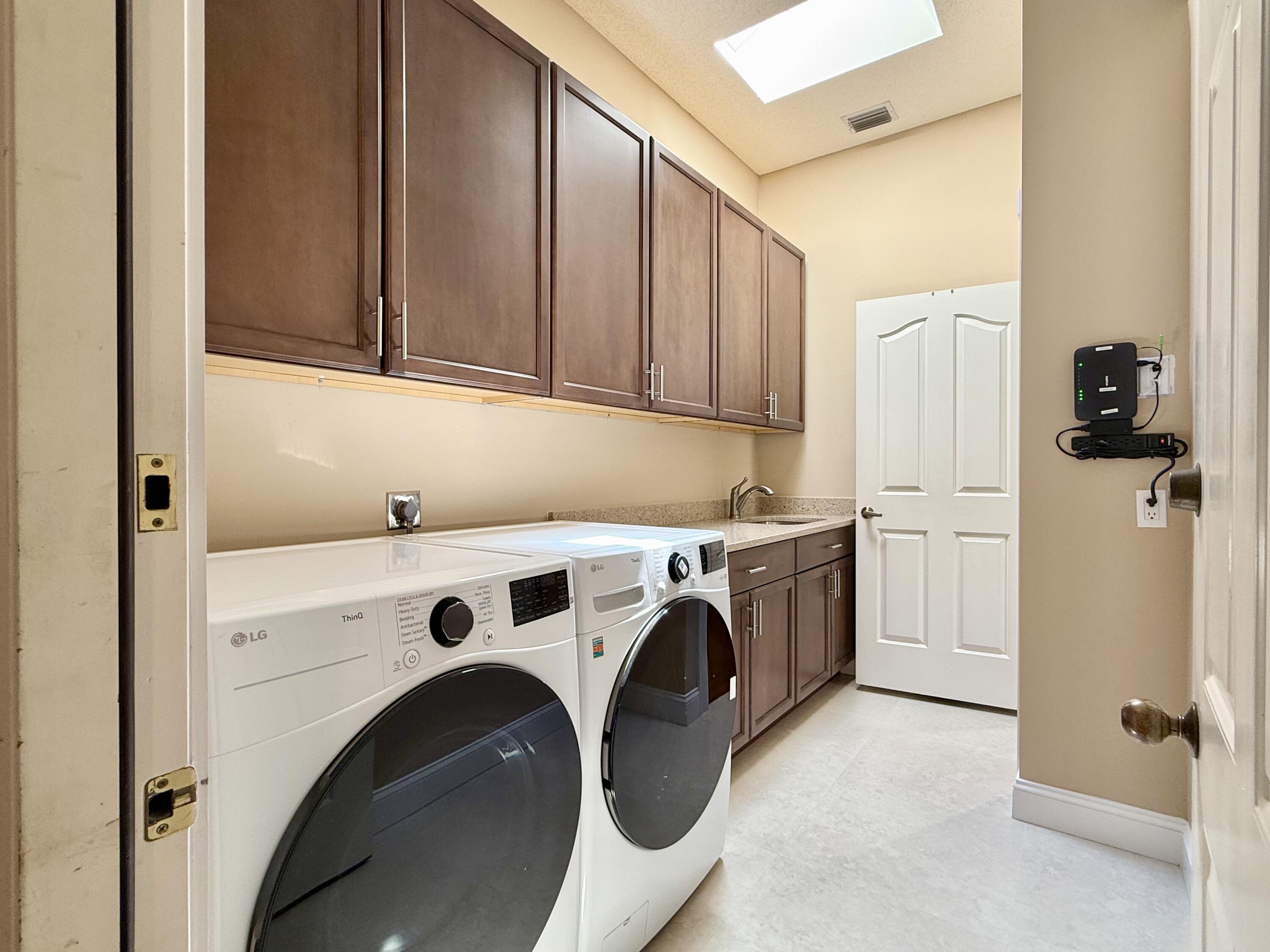 187 Hampton Circle Jupiter, FL 33458 - Photo 52 of 80 Laundry Room