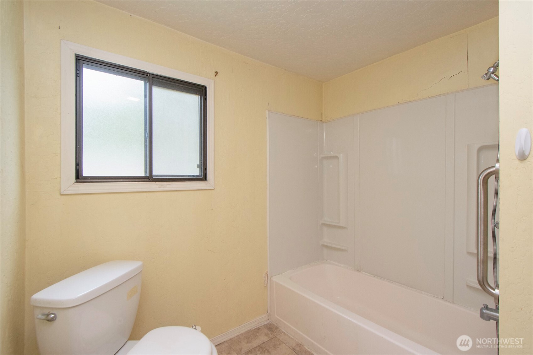 90 Baywood Village Road, Unit 34 Sequim, WA 98382 - Photo 30 of 40 a white toilet sitting next to a bath tub
