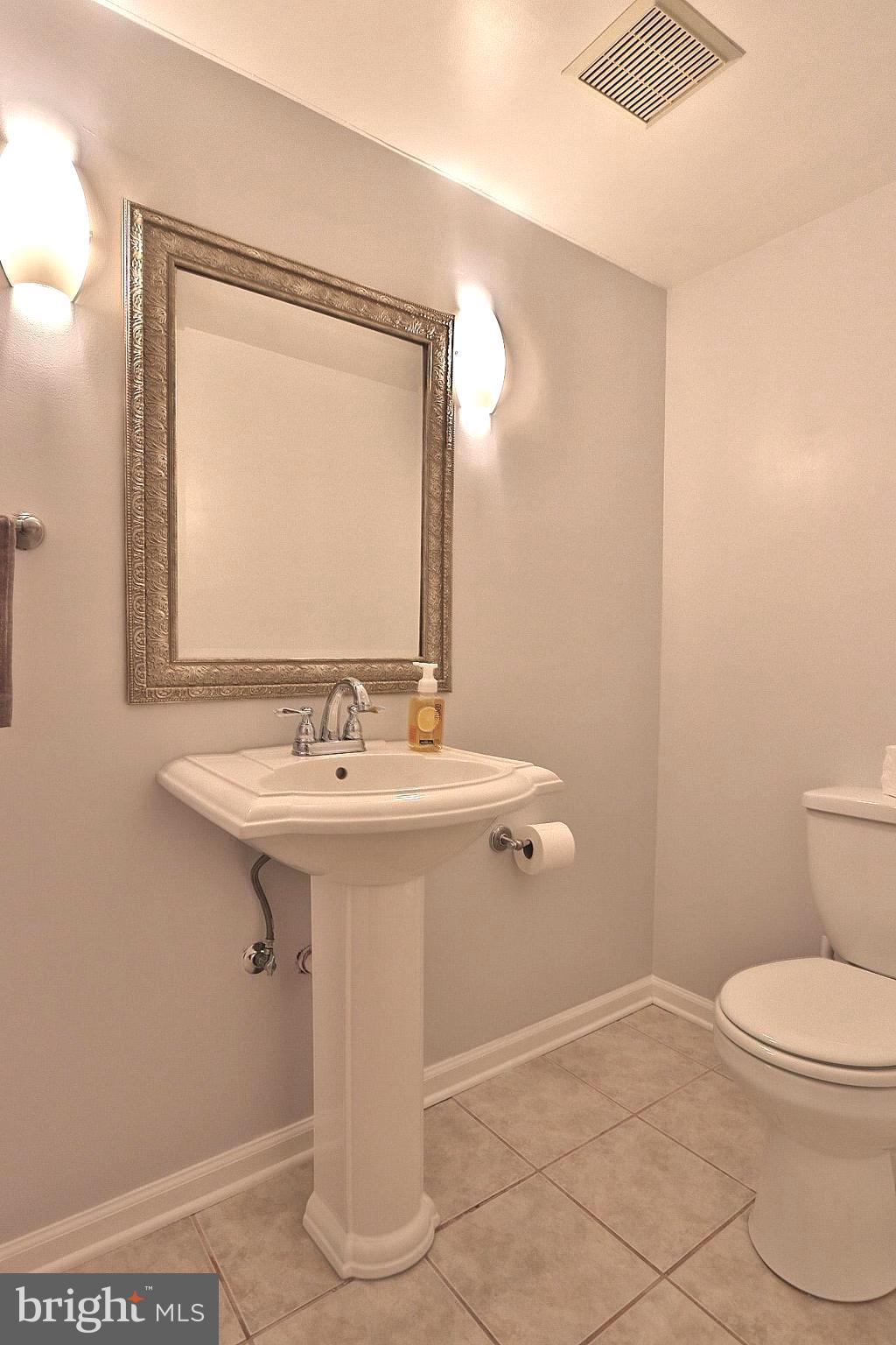 114 Rabbit Chase Drive Laurel, MD 20724 - Photo 24 of 37 Lower level Half bath w/ new faucet