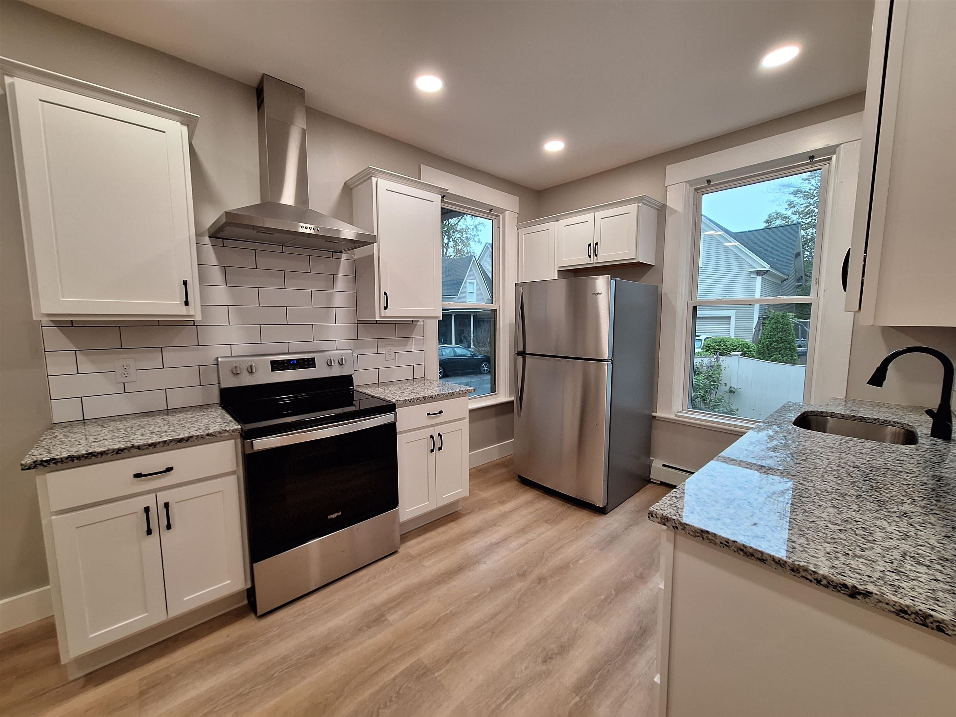 1934 Elm Street, Unit 1 Manchester, NH 03104 - Photo 1 of 12