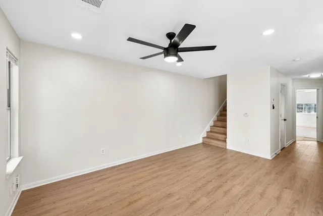 a bedroom with a bed and a table