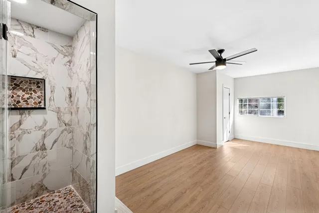 a kitchen with stainless steel appliances a sink stove and refrigerator