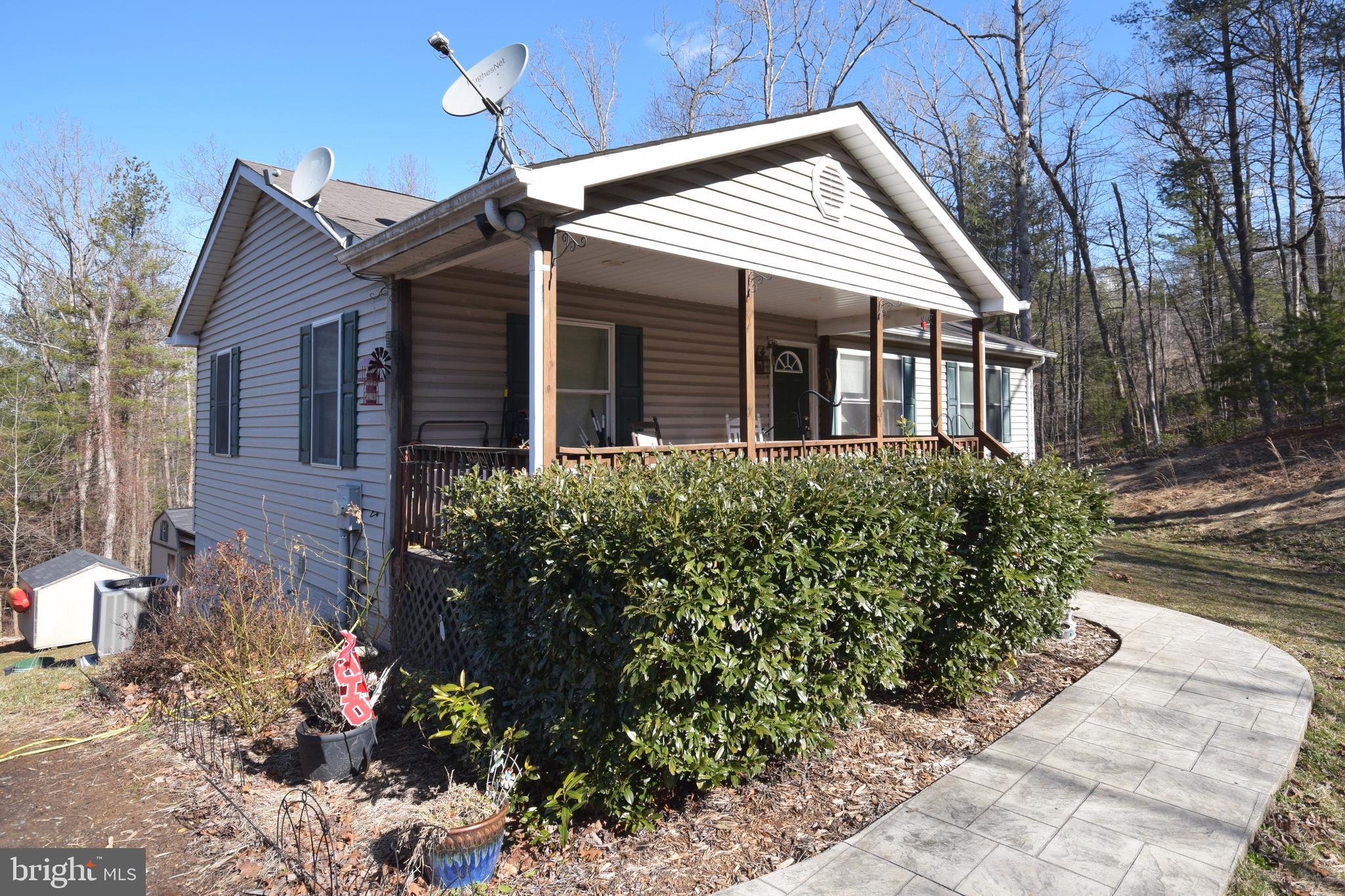 97 Spring Hollow Road Front Royal, VA 22630 - Photo 2 of 38 a view of a house with a yard